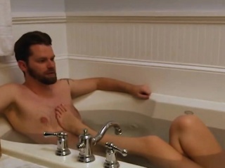Lovely couple taking shower together