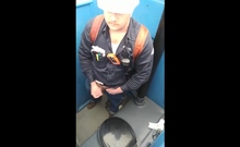 Bearded Hunk Strokes Cock Outdoors in a Porty Potty