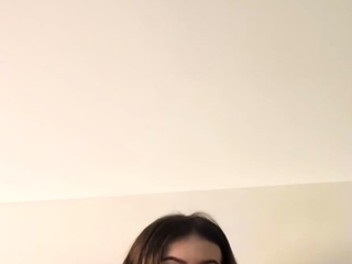 Adrianna Savu in a jumpsuit, getting well-prepped to put on
